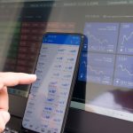 Forex trading on smartphone and computer