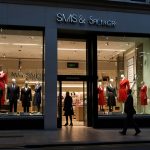 Vibrant Marks & Spencer storefront in London, showcasing its iconic British retail presence with inviting displays.