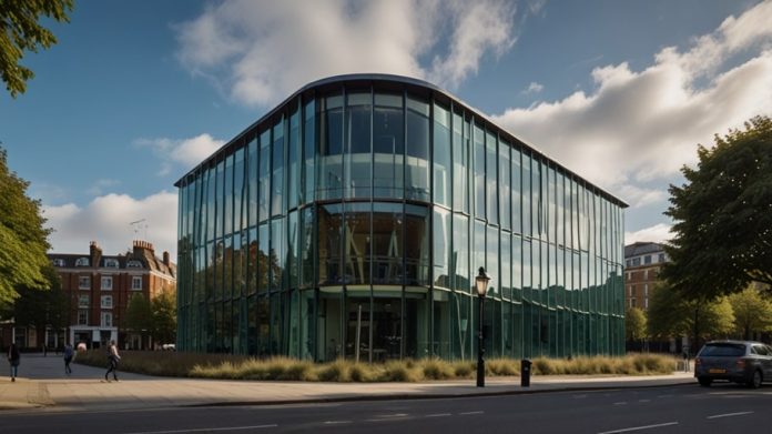 Modern glass building of Starling Bank’s headquarters in London under a clear sky.