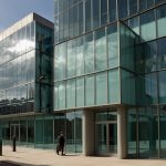 Modern office building with glass facade, representing Kier Group's headquarters in Manchester, UK.