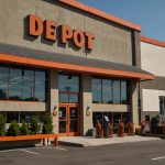 A vibrant Home Depot store exterior with customers entering and exiting, showcasing a busy retail environment with bright orange signage.