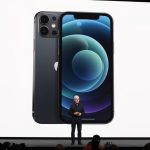 Tim Cook presenting the iPhone 18 on stage at Apple’s Cupertino event, showcasing its AI-powered holographic display.