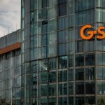 GSK headquarters in Brentford London with Shingrix vaccine vial and FTSE 100 chart showing GSK +4.1% surge October 29 2025