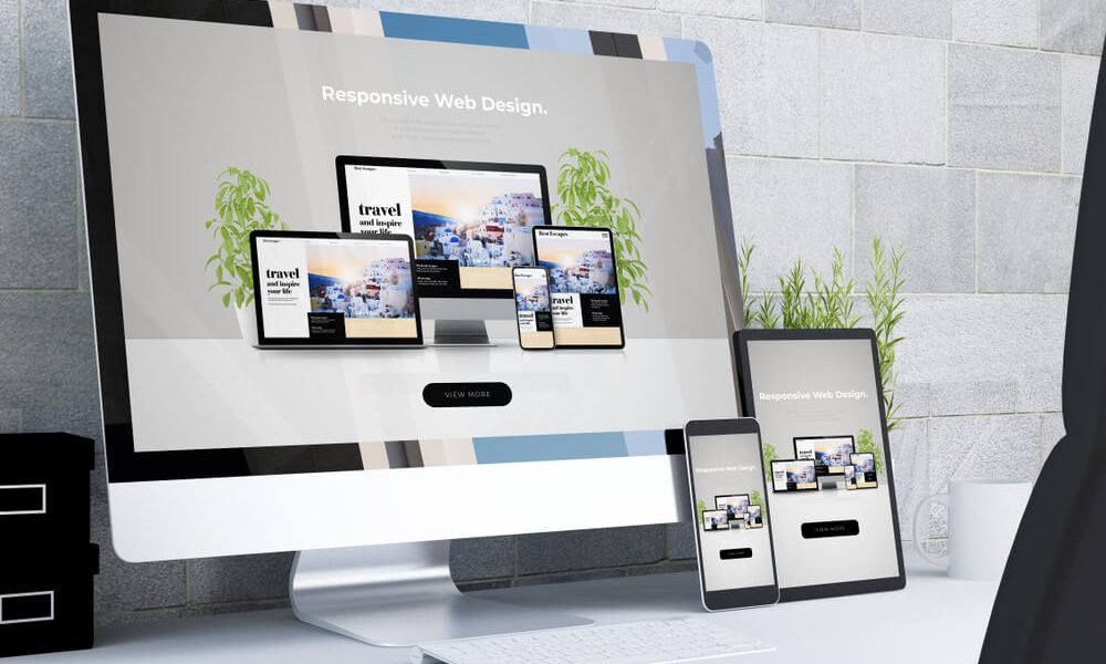Business website displayed on desktop and mobile devices in a Lancashire workplace.