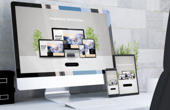 Business website displayed on desktop and mobile devices in a Lancashire workplace.