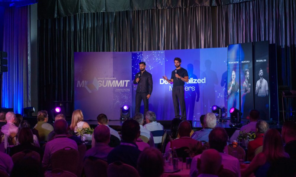 Decentralized Masters founders on stage at the MI Summit