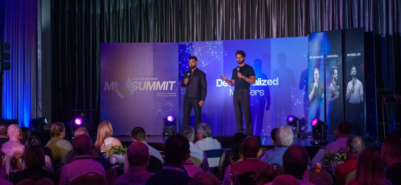 Decentralized Masters founders on stage at the MI Summit