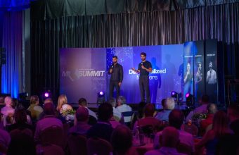 Decentralized Masters founders on stage at the MI Summit