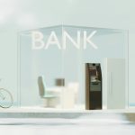 Glass-fronted local bank branch with an ATM