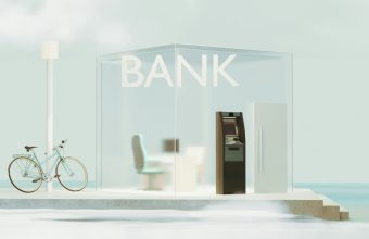 Glass-fronted local bank branch with an ATM