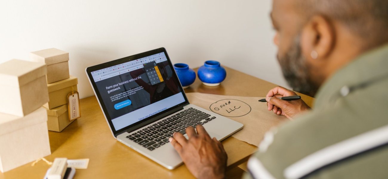 Small business owner reviewing finances