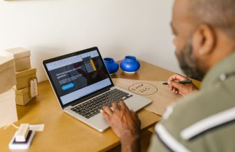 Small business owner reviewing finances
