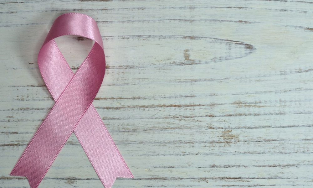 Pink ribbon for breast cancer awareness, symbolising the cancer research funded by Bricoleur Vineyards Sip With Purpose campaign