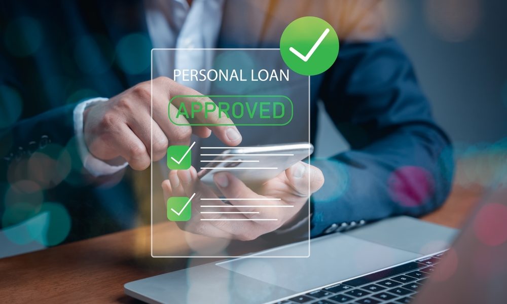 Personal loan approved on a mobile phone, illustrating Evlo consumer lending and collections technology