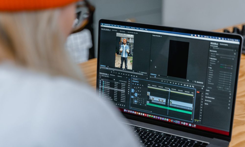 Video editing software timeline open on a laptop