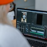 Video editing software timeline open on a laptop