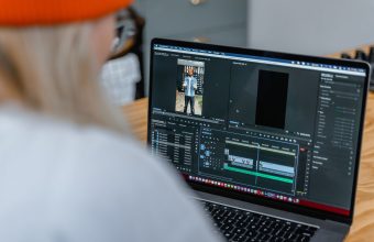 Video editing software timeline open on a laptop