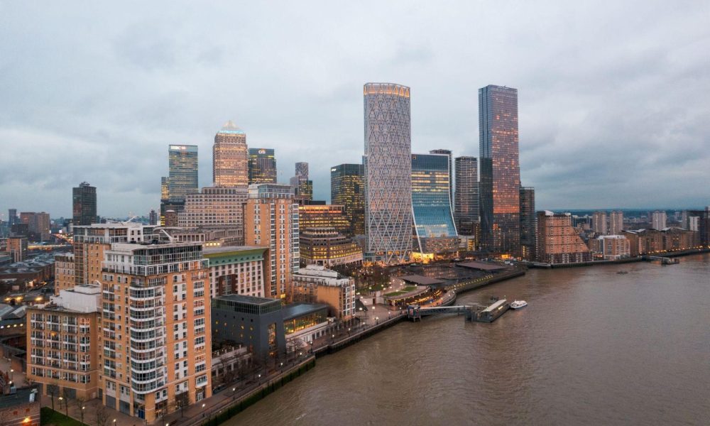 Aerial view of city buildings by the water