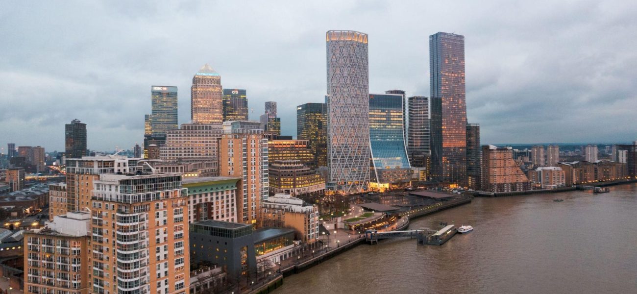Aerial view of city buildings by the water