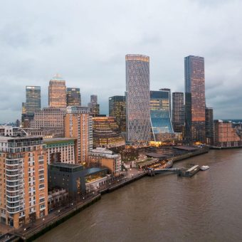 Aerial view of city buildings by the water