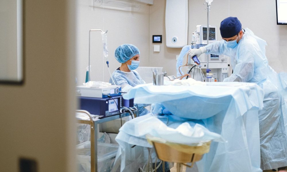 Clinicians at work in an endoscopy suite, where new colonoscopy technologies are being adopted