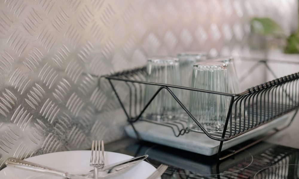 Dish rack with glassware on a kitchen counter