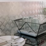 Dish rack with glassware on a kitchen counter