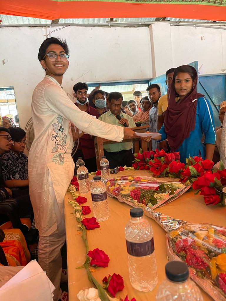 Scholarship presentation at a Bangladesh school supported by Mujjahid Huq