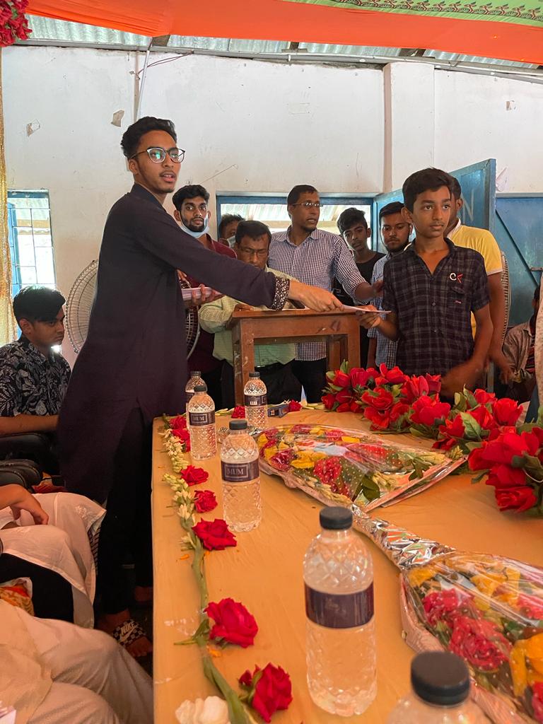 A sponsored student speaks at a Mujjahid Huq education sponsorship event in Bangladesh